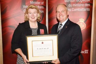 Dr. Alice Aiken with Minister O'Toole, photo courtesy of Veterans Affairs Canada.